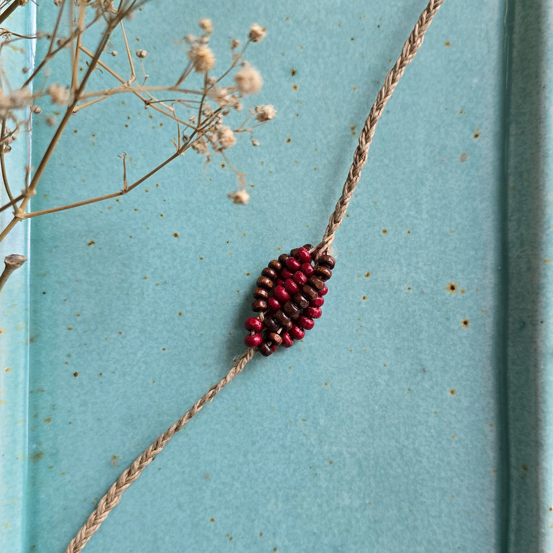 Handcrafted Jute Thread Brown & Red Wood Bead Rakhi For Brother