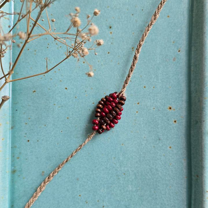 Handcrafted Jute Thread Brown & Red Wood Bead Rakhi For Brother
