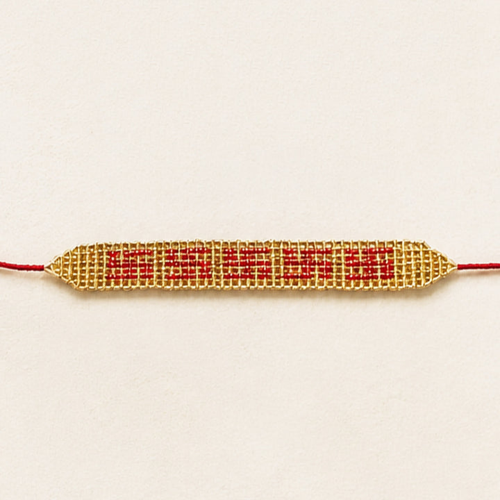 Hand Beaded Auspicious Swastik Golden Bracelet Rakhi With Roli Chawal For Brother