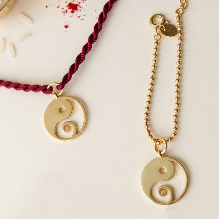 Yin And Yang With Ganesha Gold Plated Sterling Silver Rakhi & Lumba Set With Roli Chawal For Bhaiya Bhabhi | Set of 2