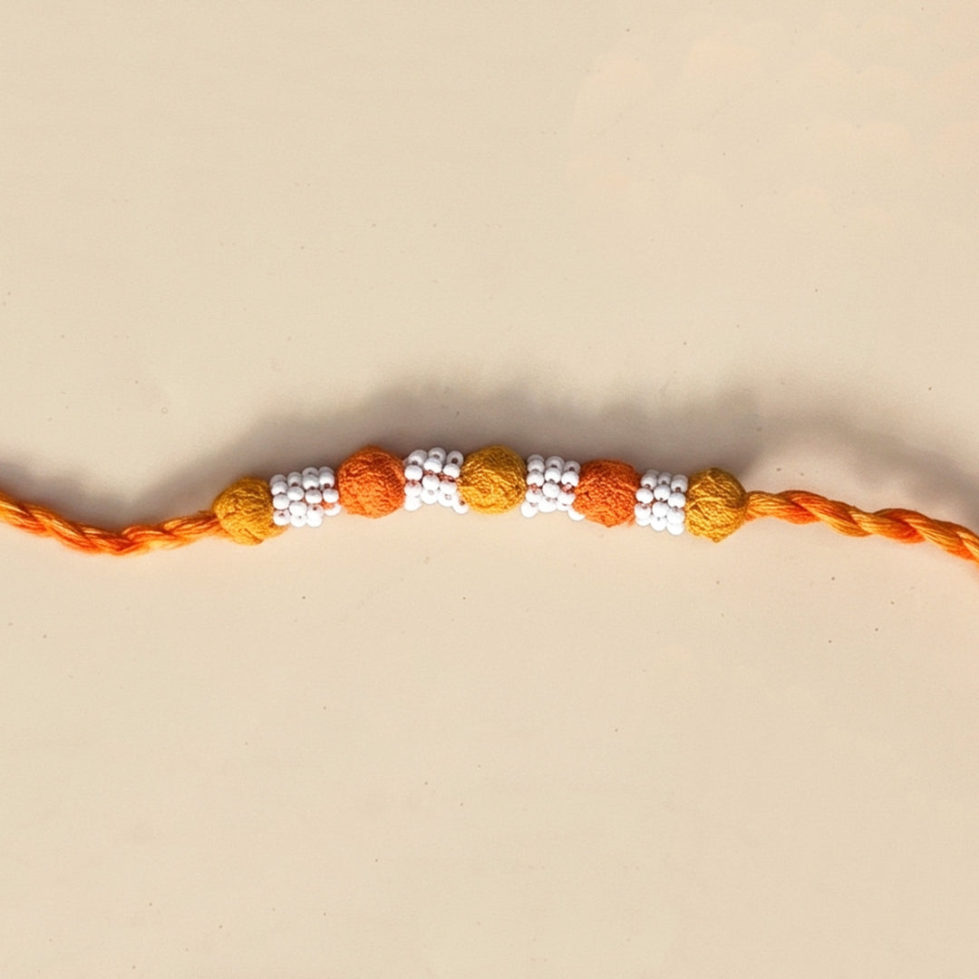 Handmade Reusable Orange And Yellow Beaded Patwa Rakhi For Brother