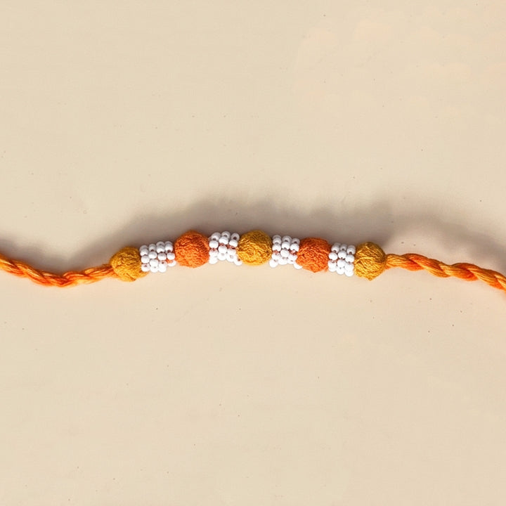 Handmade Reusable Orange And Yellow Beaded Patwa Rakhi For Brother