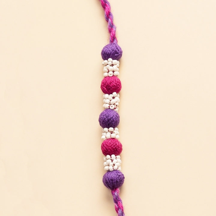 Handmade Reusable Rani Pink And Purple Beaded Patwa Rakhi For Brother