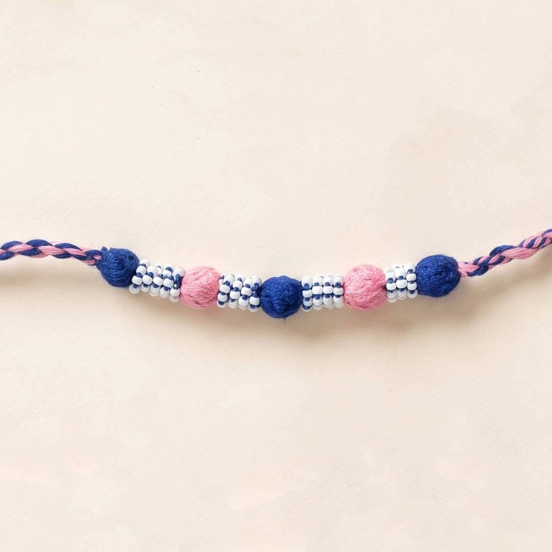 Handmade Reusable Blue And Light Pink Beaded Patwa Rakhi For Brother