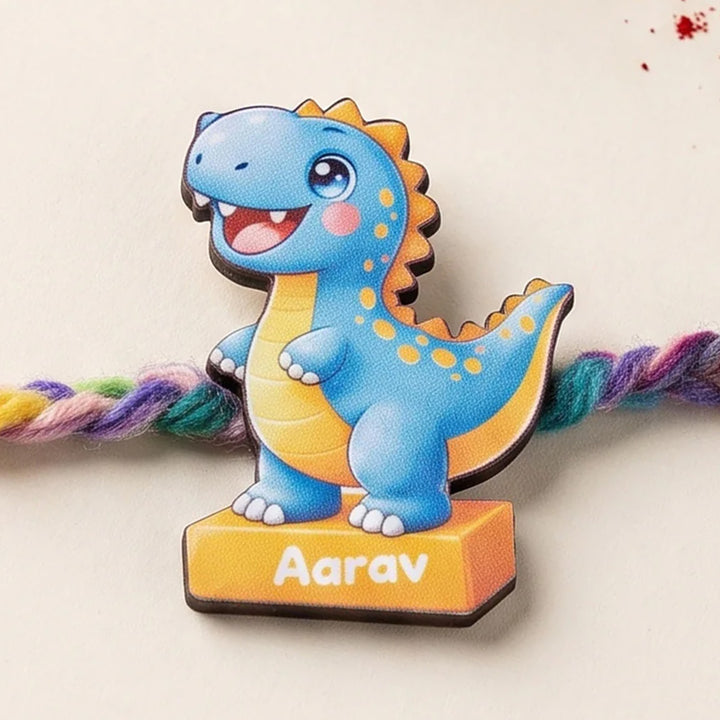 Personalized Reusable Blue Dino MDF Wood Rakhi With Roli Chawal