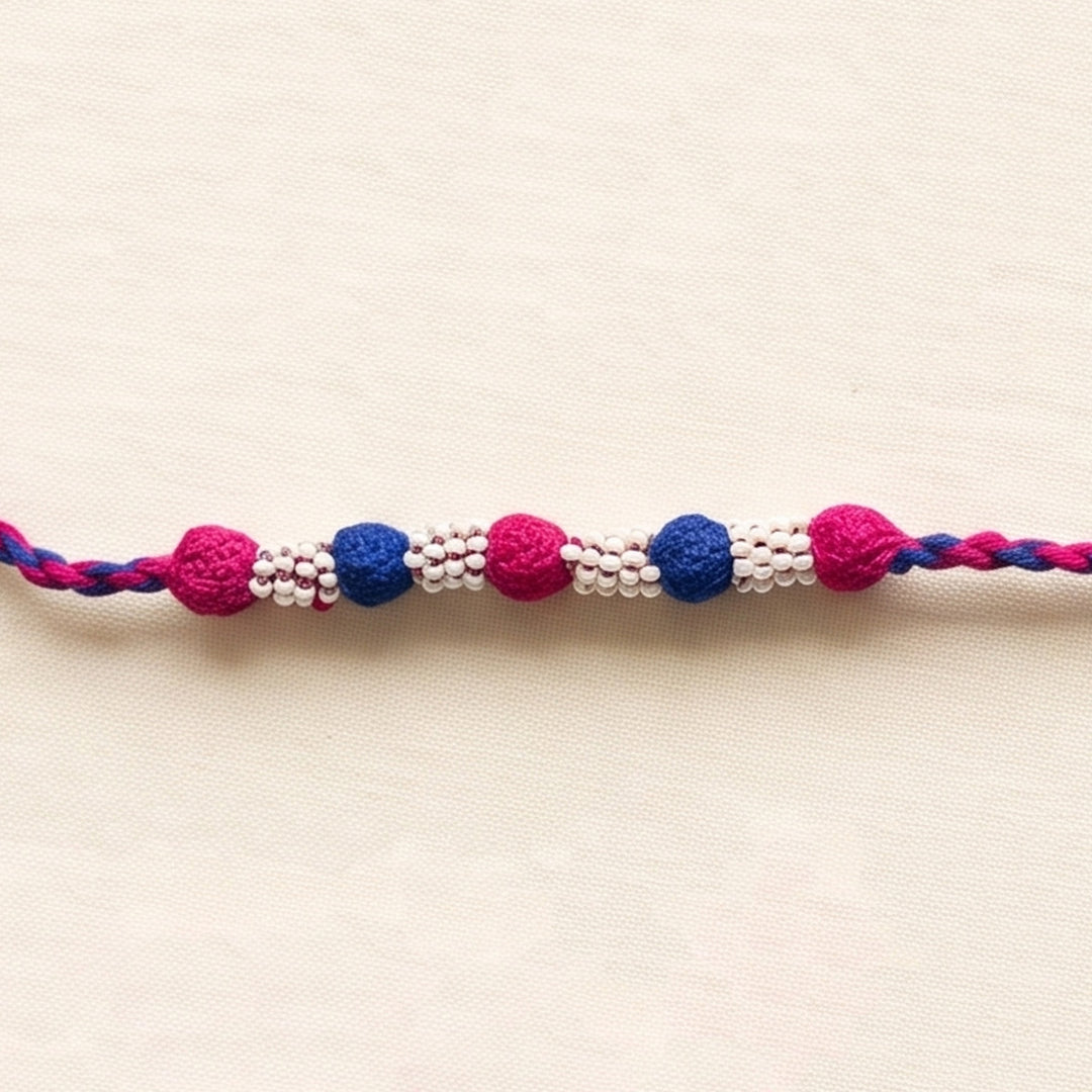 Handmade Reusable Rani Pink And Blue Beaded Patwa Rakhi For Brother