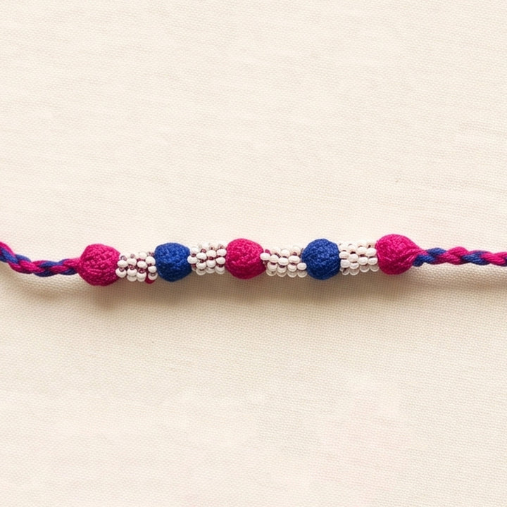 Handmade Reusable Rani Pink And Blue Beaded Patwa Rakhi For Brother