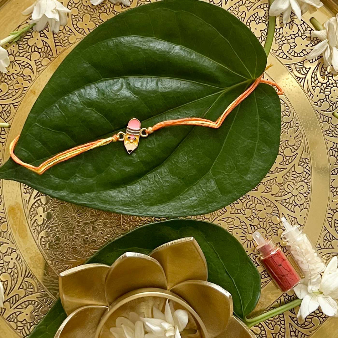Engraved Little Champion Enamel Metal Charm Rakhi With Roli Chawal for Brother