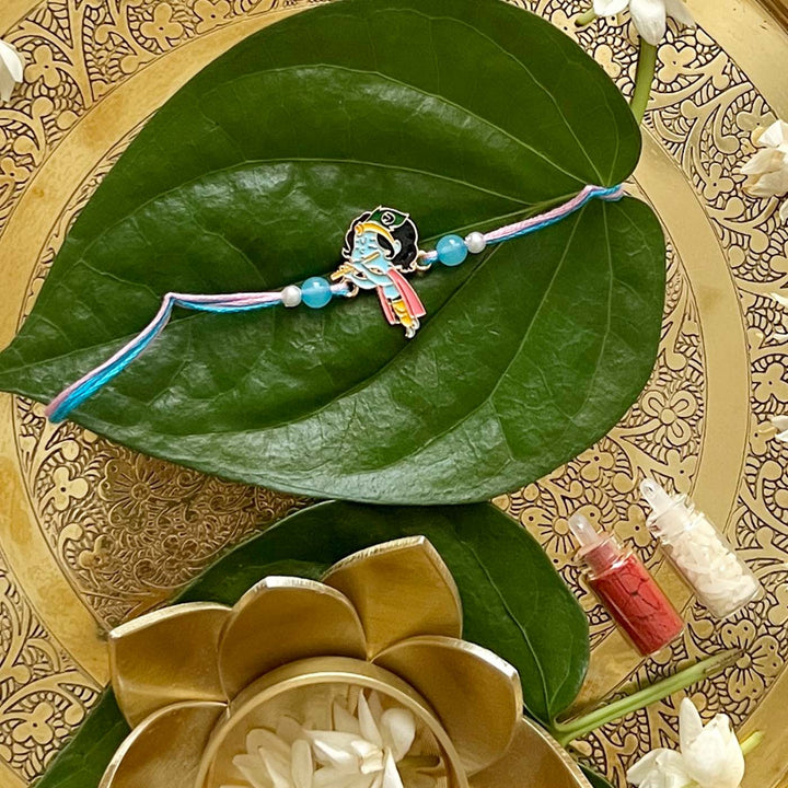 Engraved Little Krishna Enamel Metal Charm Rakhi With Roli Chawal for Brother