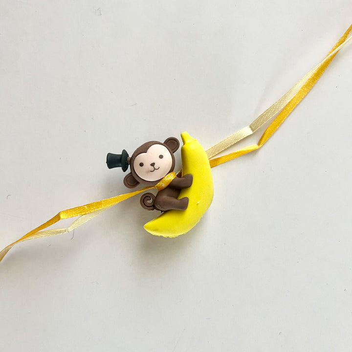 Engraved Little Monkey Rubber Charm Rakhi With Roli Chawal for Brother