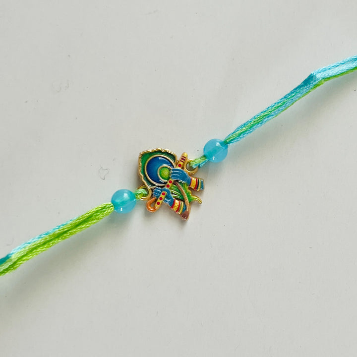 Engraved Lord Krishna Enamel Metal Charm Rakhi With Roli Chawal for Brother