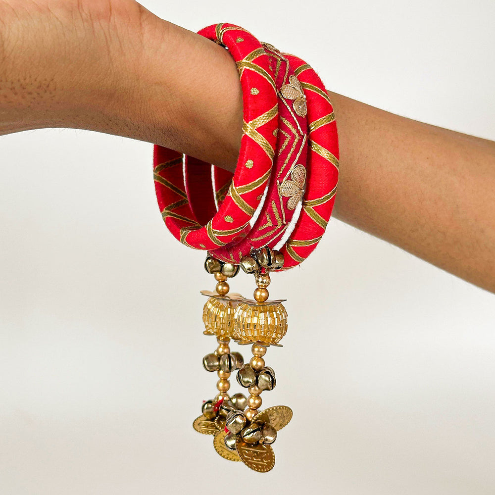 Handmade Beaded Pink Traditional Ghungroo And Zari Cotton Bangle Lumba With Roli Chawal For Bhabhi - Bangles Worn on Wrist Close-up