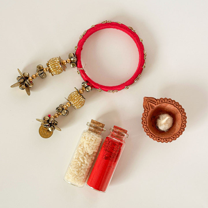 Handmade Beaded Pink Traditional Ghungroo And Sequin Cotton Bangle Lumba With Roli Chawal For Bhabhi - Styled with Accessories Flat Lay