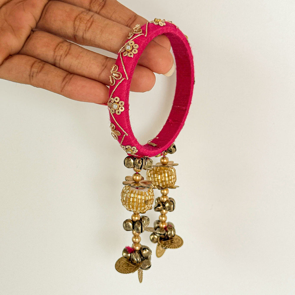 Handmade Beaded Pink Traditional Ghungroo And Sequin Cotton Bangle Lumba With Roli Chawal For Bhabhi - Holding Detail Close-up