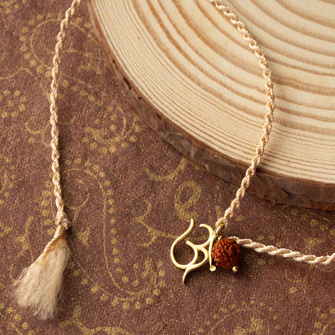 Sacred Om With Rudraksh Gold Plated Sterling Silver Charm Rakhi With Roli Chawal For Brother