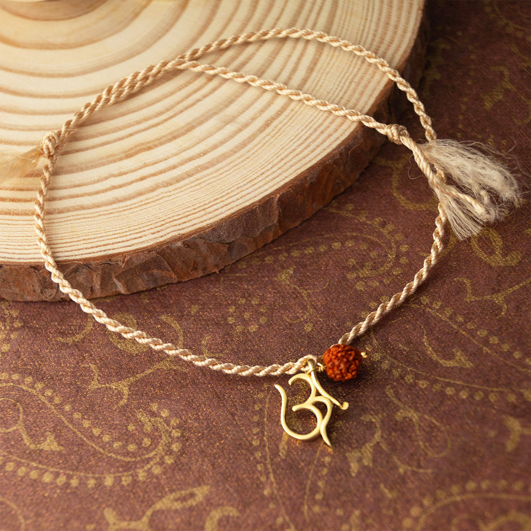 Sacred Om With Rudraksh Gold Plated Sterling Silver Charm Rakhi With Roli Chawal For Brother