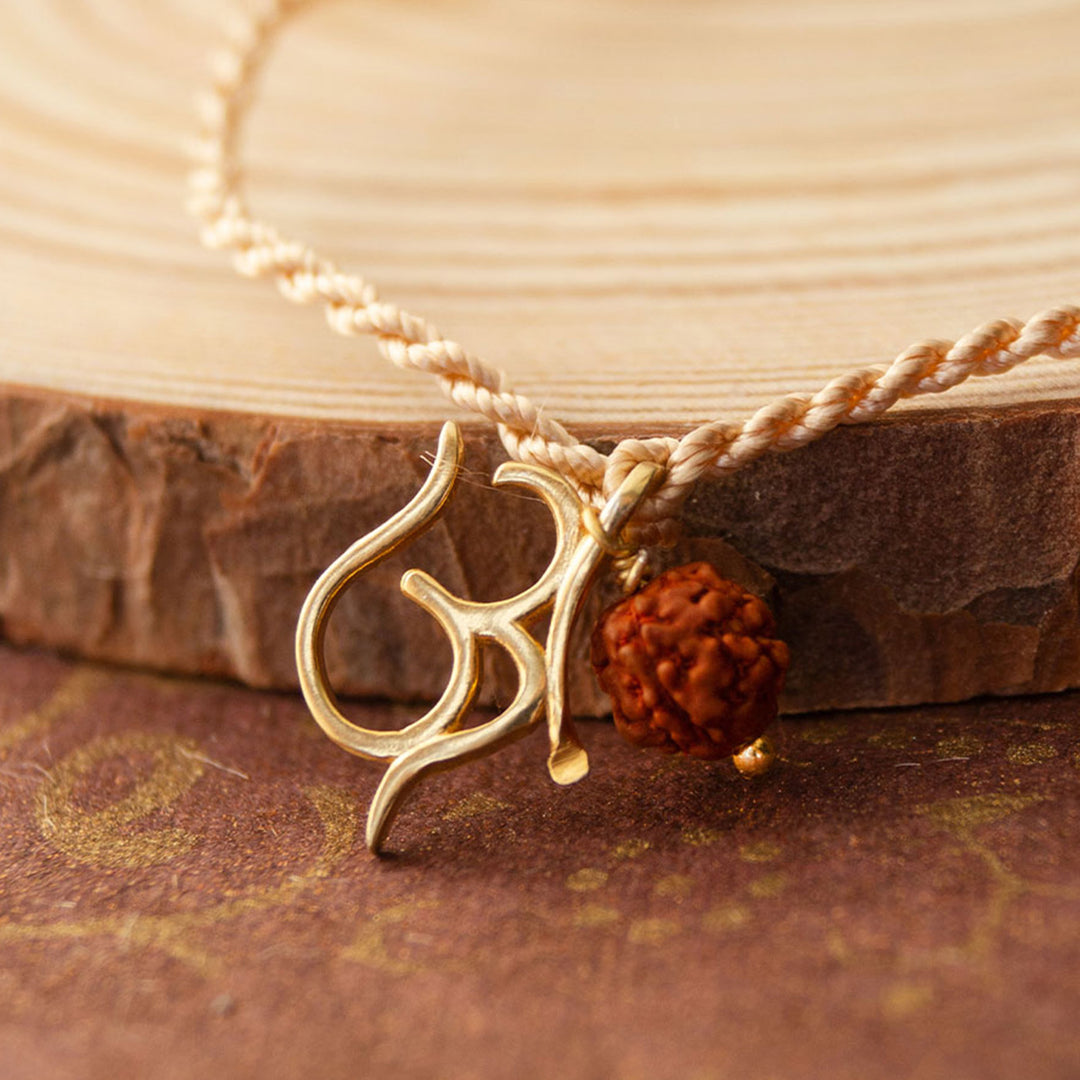 Sacred Om With Rudraksh Gold Plated Sterling Silver Charm Rakhi With Roli Chawal For Brother