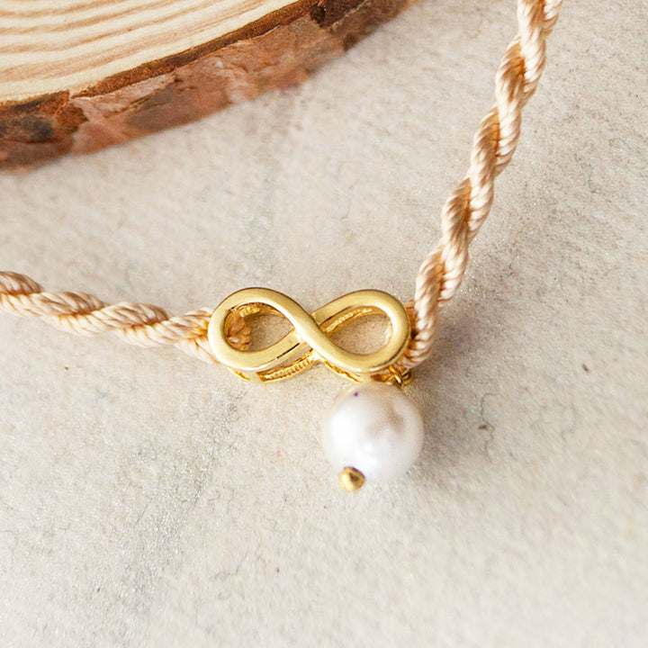 Infinity Love With Pearl Gold Plated Sterling Silver Charm Rakhi With Roli Chawal For Brother