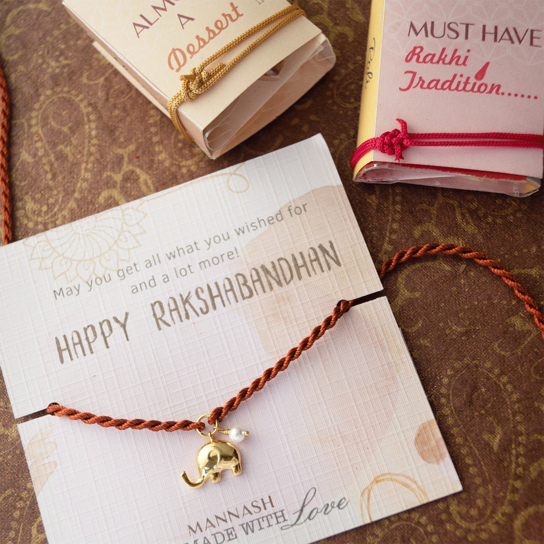 Cute Elephant With Pearl Gold Plated Sterling Silver Charm Rakhi With Roli Chawal For Brother