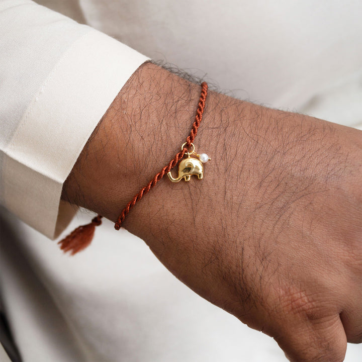 Cute Elephant With Pearl Gold Plated Sterling Silver Charm Rakhi With Roli Chawal For Brother