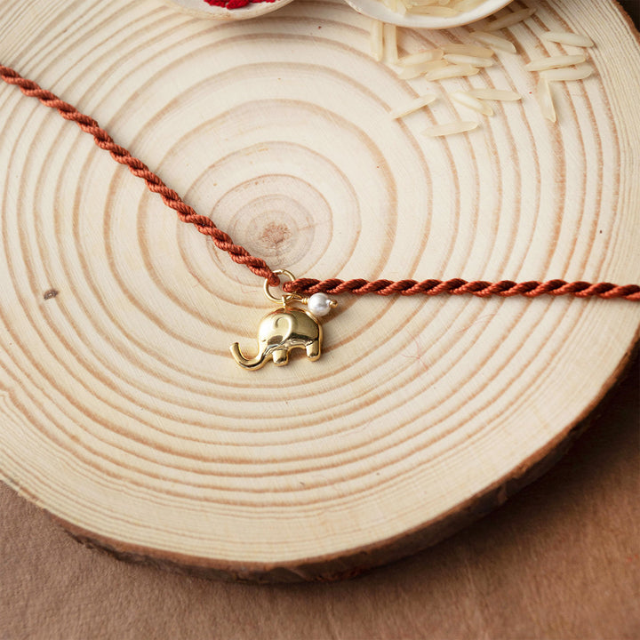 Cute Elephant With Pearl Gold Plated Sterling Silver Charm Rakhi With Roli Chawal For Brother