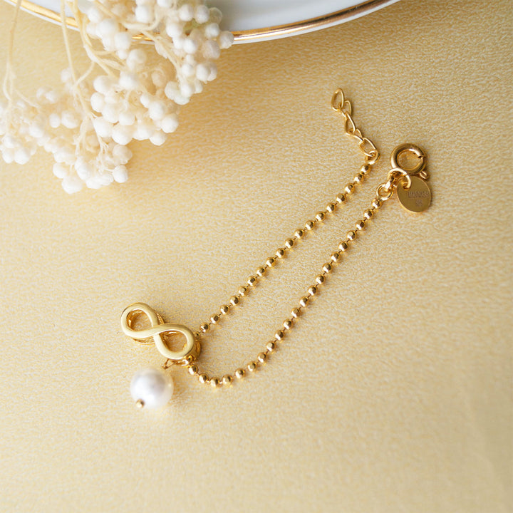 Infinity Love With Pearl Gold Plated Sterling Silver Rakhi & Lumba Set With Roli Chawal For Bhaiya Bhabhi | Set of 2