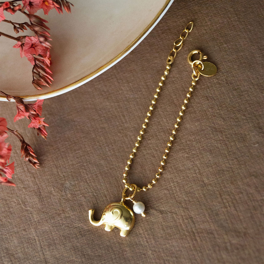 Cute Elephant With Pearl Gold Plated Sterling Silver Rakhi & Lumba Set With Roli Chawal For Bhaiya Bhabhi | Set of 2