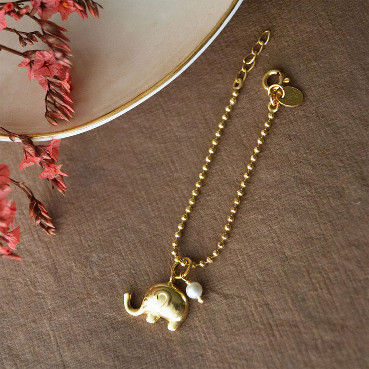 Cute Elephant With Pearl Gold Plated Sterling Silver Rakhi & Lumba Set With Roli Chawal For Bhaiya Bhabhi | Set of 2