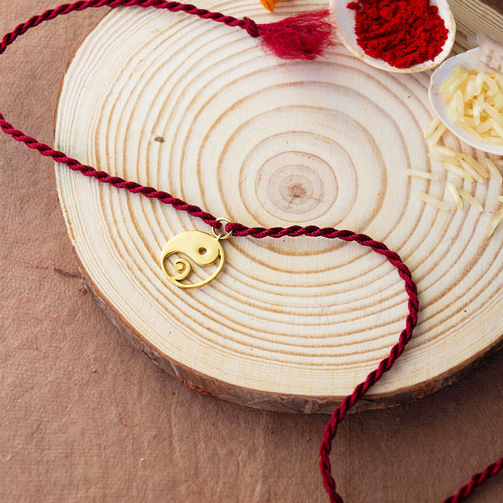 Yin And Yang With Ganesha Gold Plated Sterling Silver Charm Rakhi With Roli Chawal For Brother