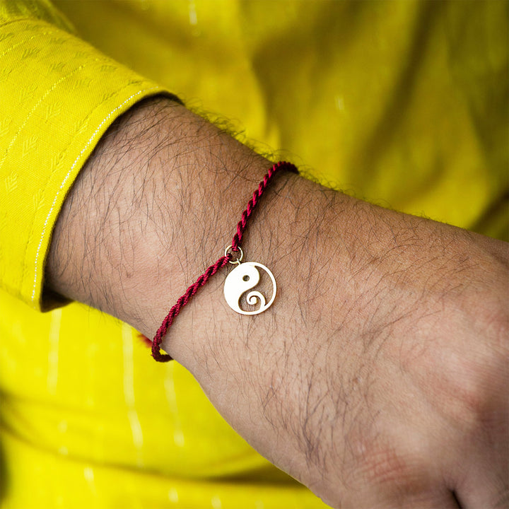 Yin And Yang With Ganesha Gold Plated Sterling Silver Charm Rakhi With Roli Chawal For Brother