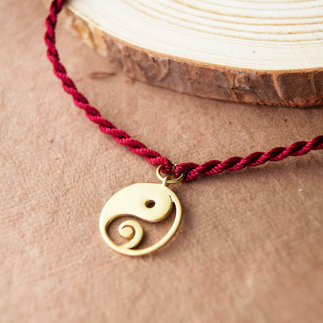 Yin And Yang With Ganesha Gold Plated Sterling Silver Charm Rakhi With Roli Chawal For Brother