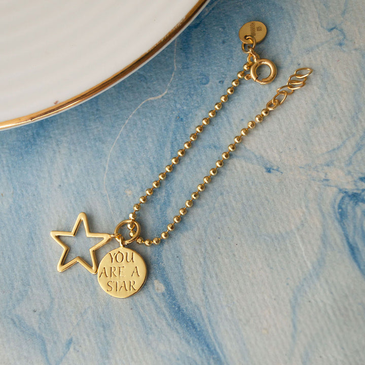 "You Are A Star" Gold Plated Sterling Silver Rakhi & Lumba Set With Roli Chawal For Bhaiya Bhabhi | Set of 2
