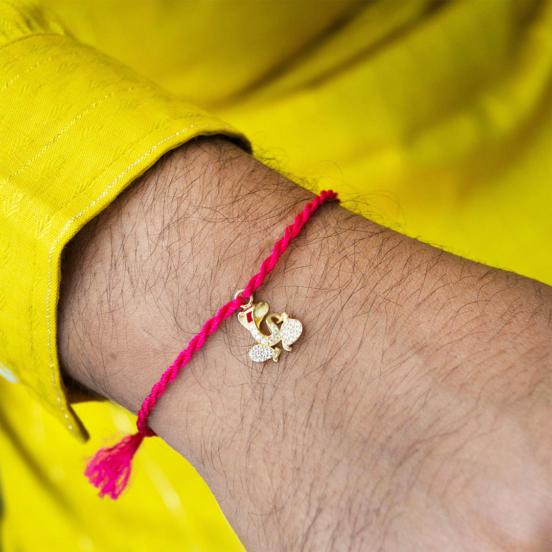Divine Ganesha Gold Plated Sterling Silver Charm Rakhi With Roli Chawal For Brother