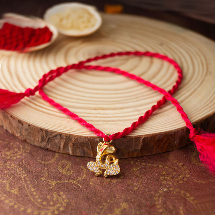 Divine Ganesha Gold Plated Sterling Silver Rakhi & Lumba Set With Roli Chawal For Bhaiya Bhabhi | Set of 2