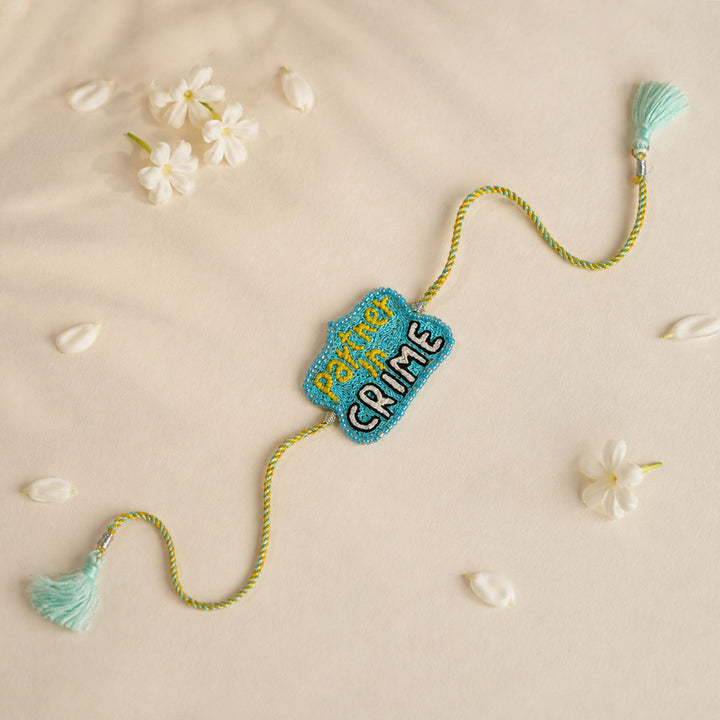 Handmade Beaded Partner In Crime Theme Rakhi With Roli Chawal For Brother