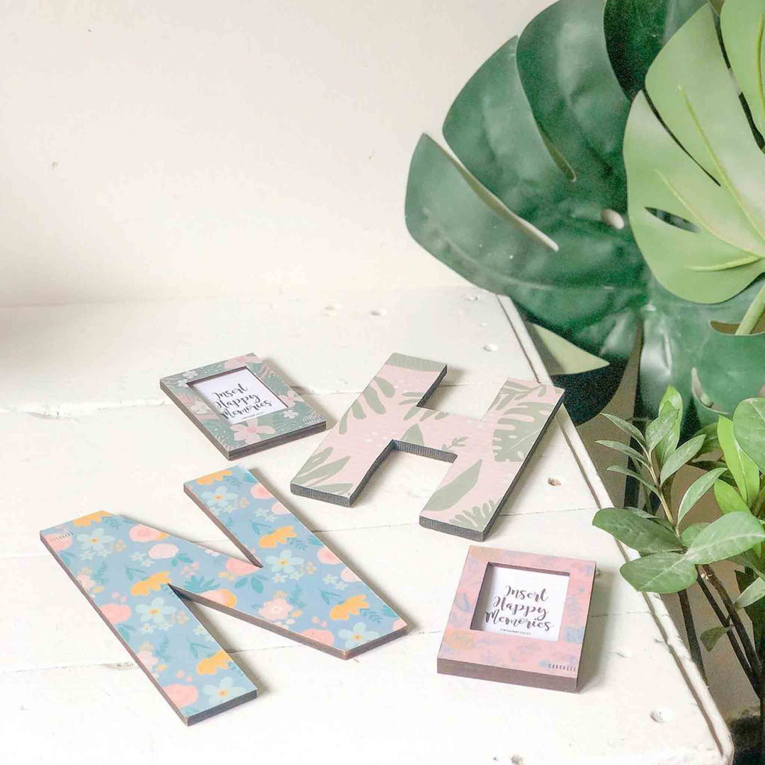 Printed Monogram Desk Initial With Polaroid Photo Frame - Flat Lay Display Showing Multiple Items