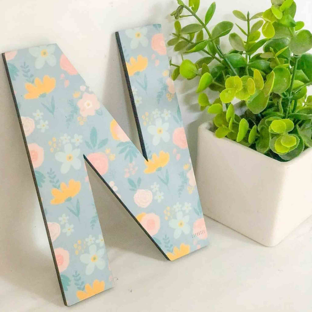 Printed Monogram Desk Initial With Polaroid Photo Frame - Angled Side View on Surface