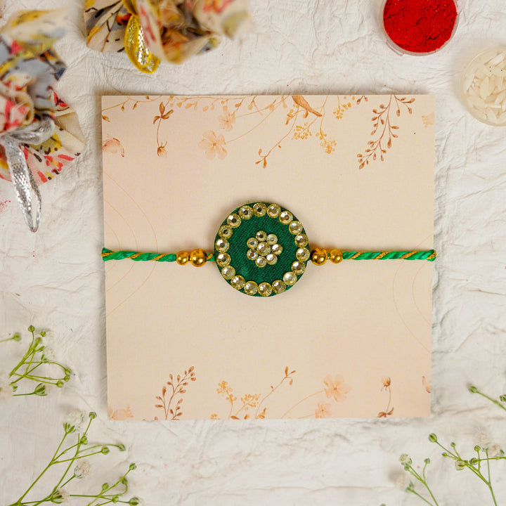 Handmade Silk Crystal Rakhi With Roli Chawal - Front View Green Rakhi