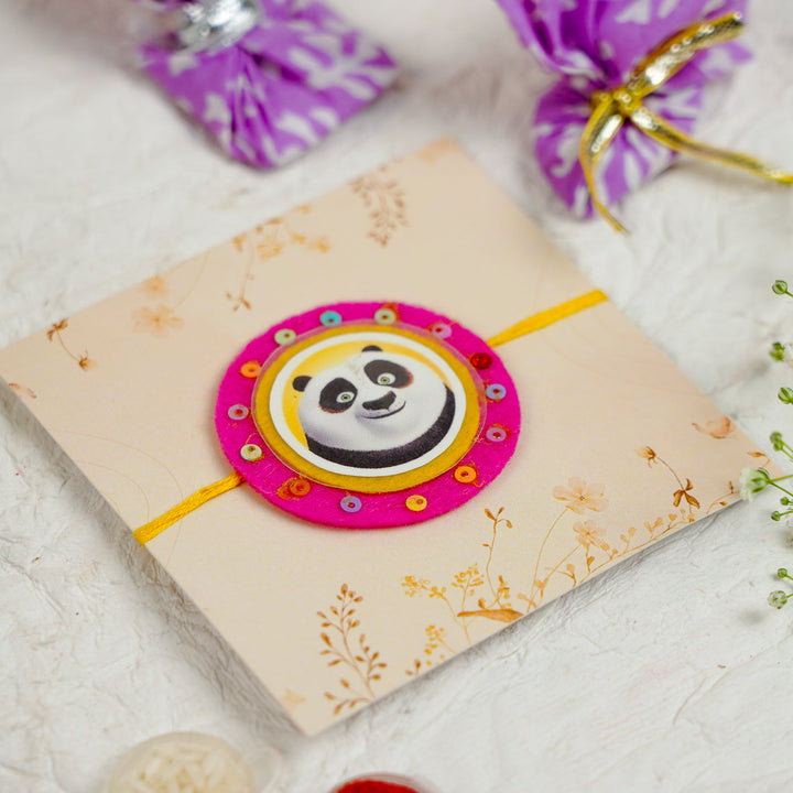 Handmade Kung Fu Panda Kids Rakhi With Roli Chawal - Angled View on Packaging