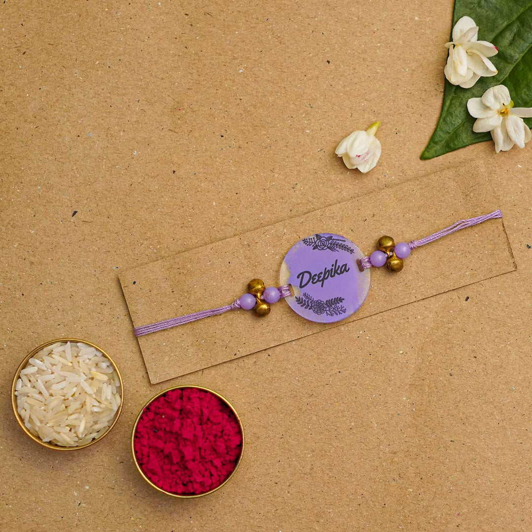 Personalized Hand Painted Name Acrylic Rakhi With Roli Chawal - Flat Lay with Rice and Kumkum (9)