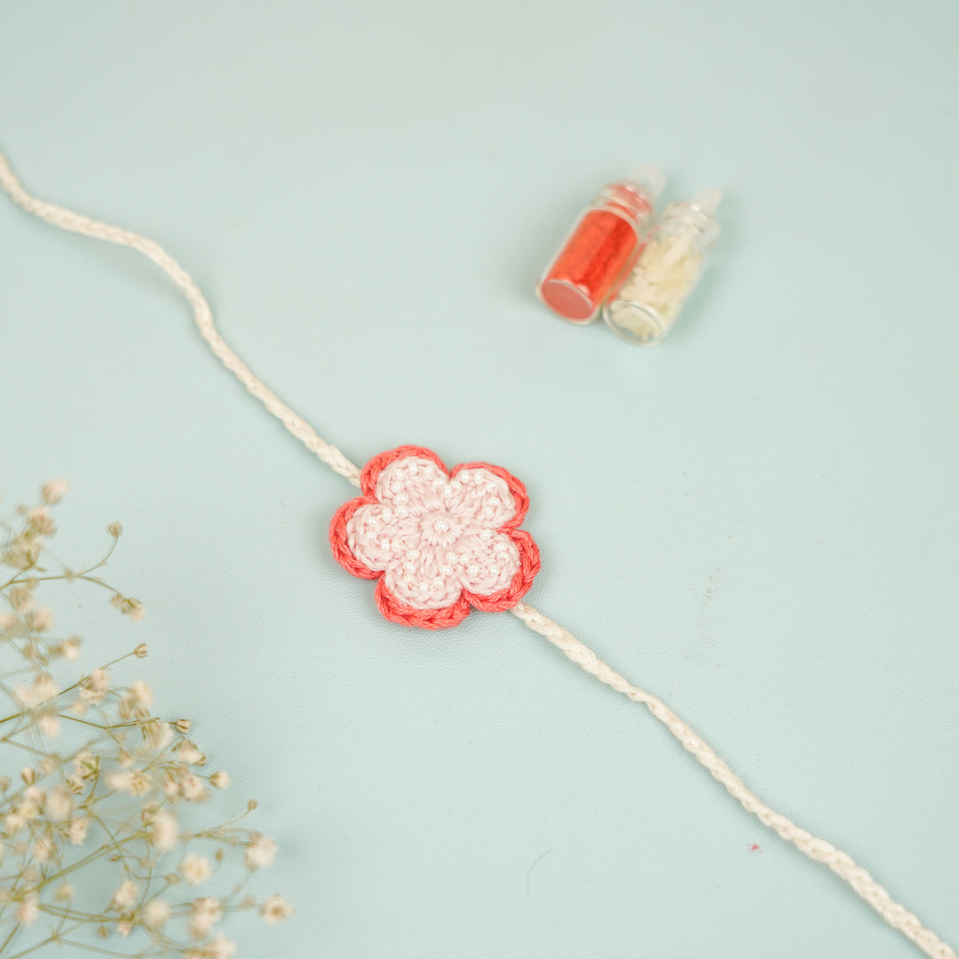Handmade Crochet Pink Daisy Rakhi With Roli Chawal