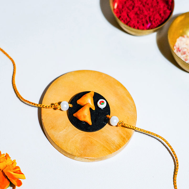 Handmade Food Themed Clay Rakhi 1 - Close-up Front View