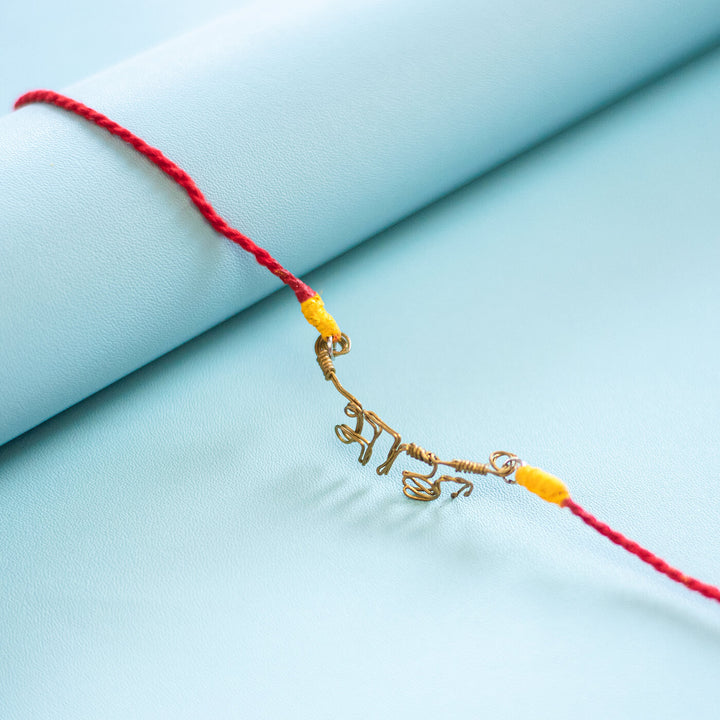 Personalized Brass Lettering Rakhi With Roli Chawal