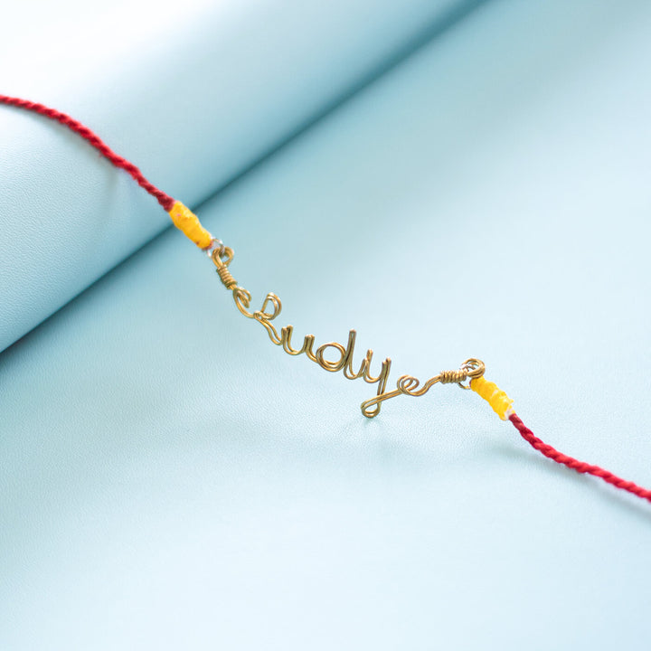Personalized Brass Lettering Rakhi With Roli Chawal