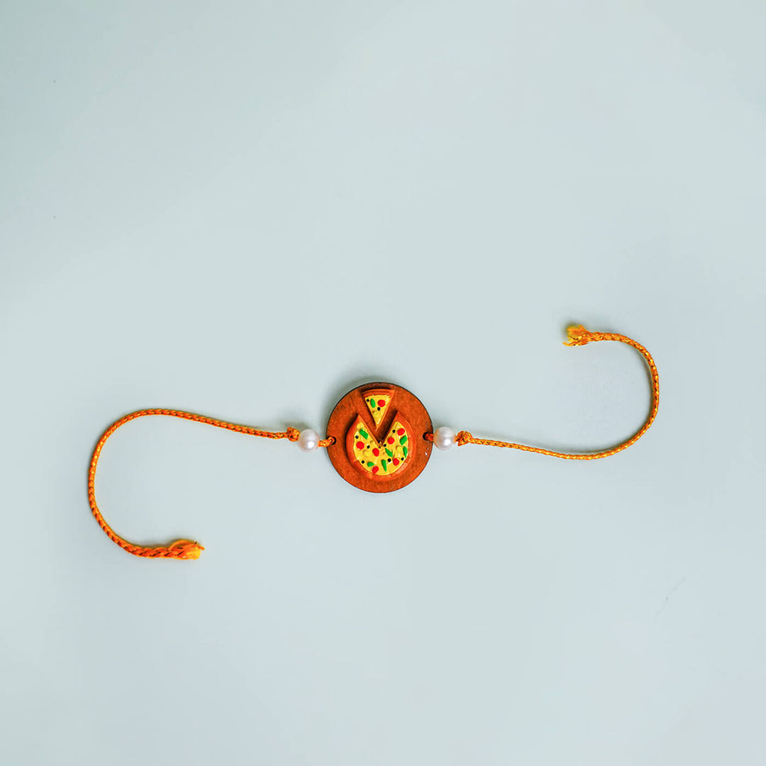 Handmade Food Themed Clay Rakhi 6 - Flat Lay with Pizza Charm