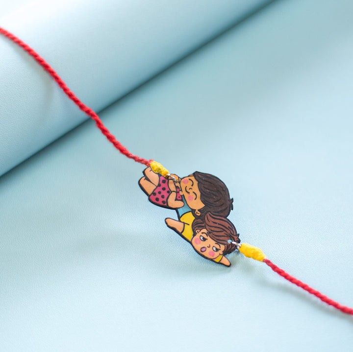 Handpainted Sibling Illustration Rakhi With Roli Chawal