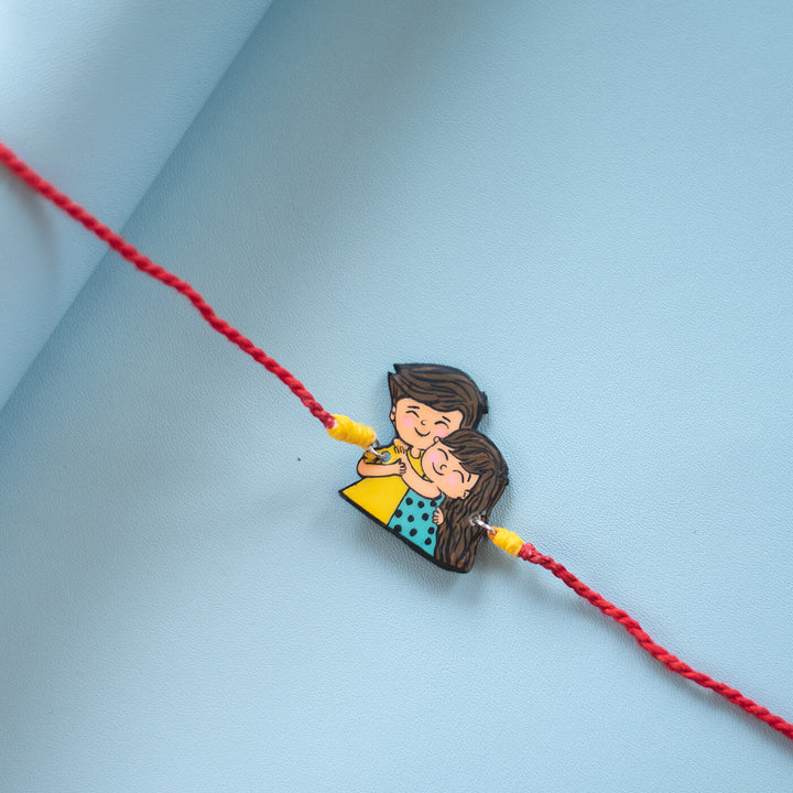 Handpainted Sibling Illustration Rakhi With Roli Chawal
