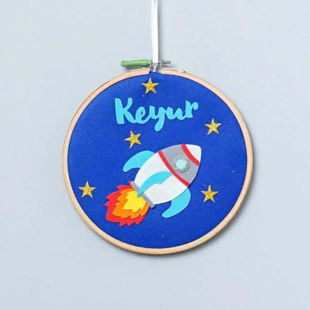 Handcrafted Personalized Rocket Hoop Nameplate - Hanging Front View with Name Personalization