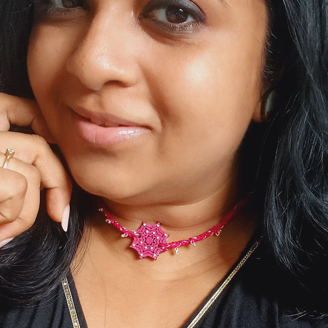 Handmade Pink Star Shape Ghungroo And Beads Wooden Bhaiya Bhabhi Rakhi With Roli Chawal - Model Wearing Necklace Choker