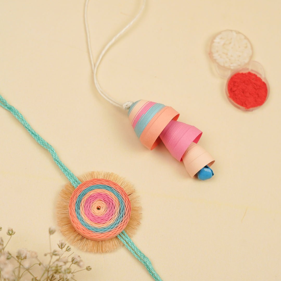 Handmade Paper Quilled Pastel Hues Bhaiya Bhabhi Rakhi With Roli Chawal | Set Of 2